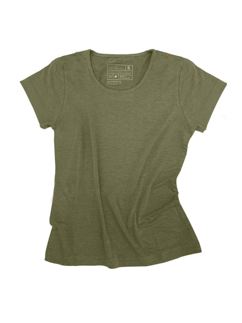 Woman in a gray Athlos Distane t-shirt sitting outdoors with trees in the background
